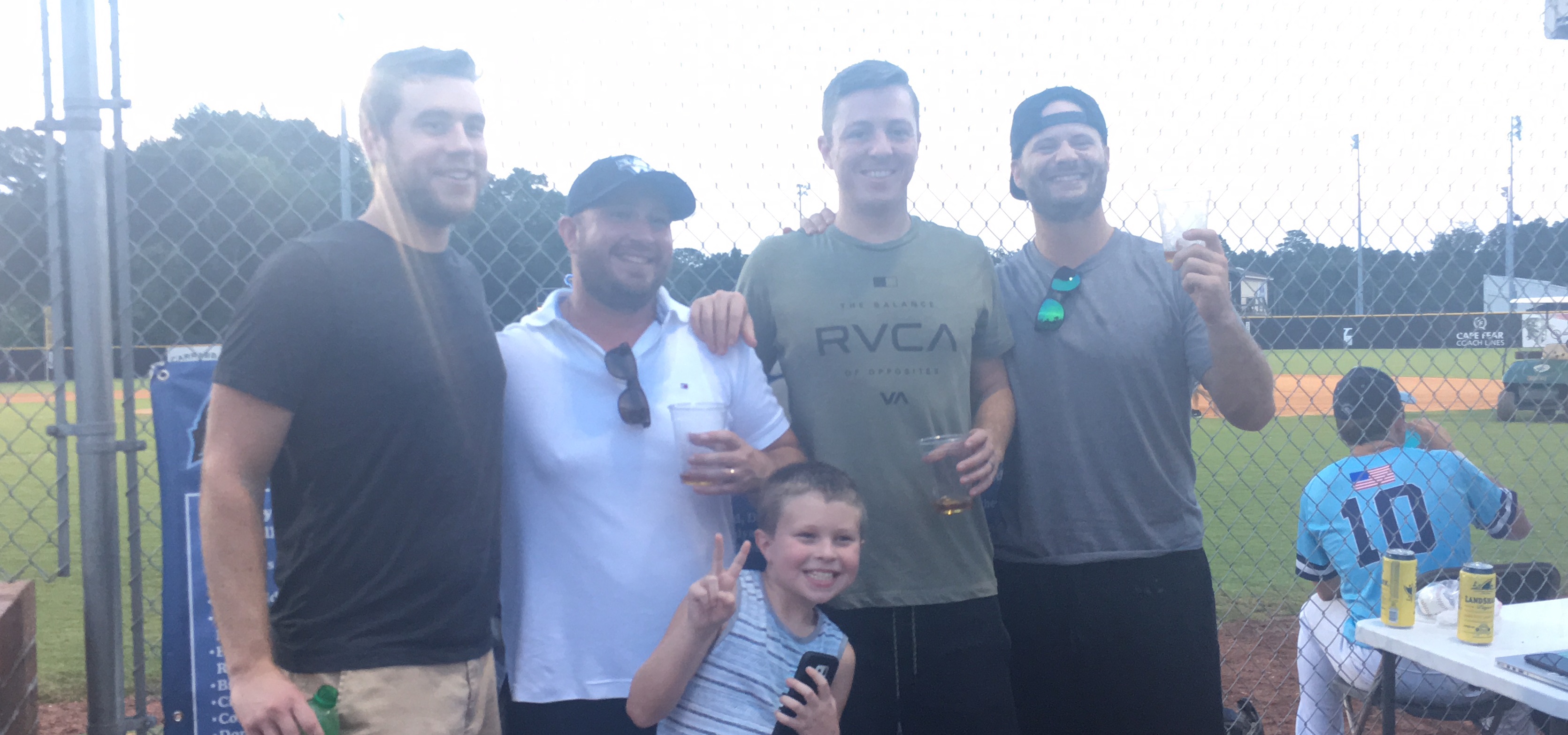 The BatterUp Crew running admin at a Sharks game